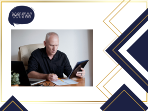 401(k): older man doing math with paper and tablet in hand