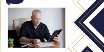 401(k): older man doing math with paper and tablet in hand